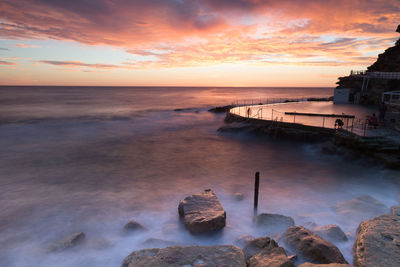 Scenic view of dramatic sky over sea