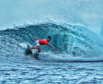 Man surfing in sea