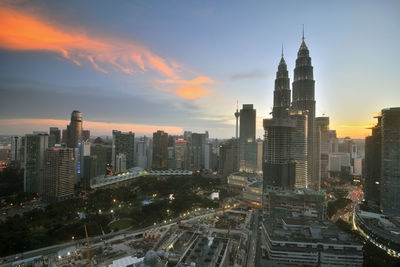 City lit up at dusk