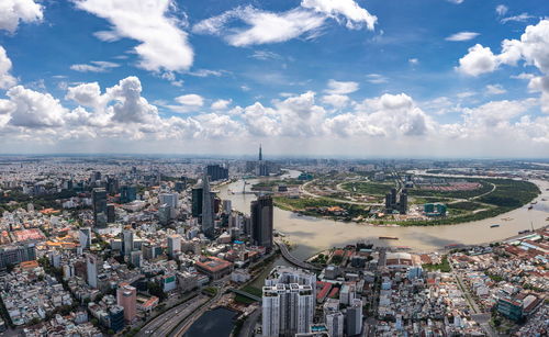 High angle view of modern buildings in city against sky