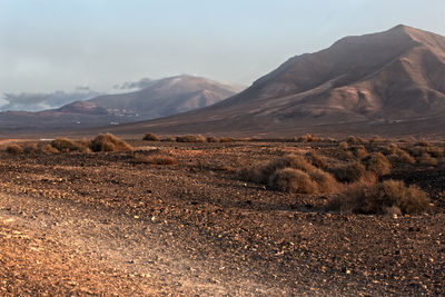 Aerial view of landscape and mountains against sky