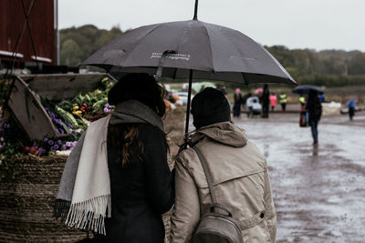 Rear view of people in winter