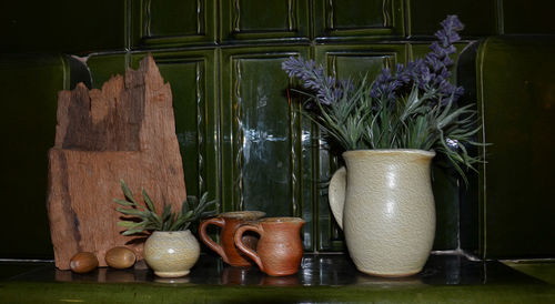 Close-up of flowers on wood
