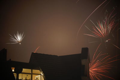Low angle view of firework display