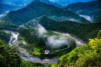 High angle view of waterfall in forest