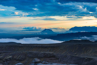 Scenic view of landscape against sky during sunset