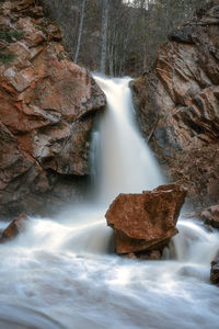 View of waterfall in forest