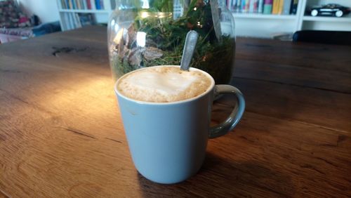 Close-up of coffee cup on table