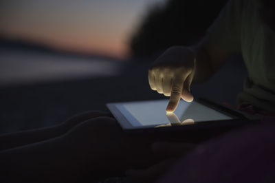 Close-up of person using mobile phone