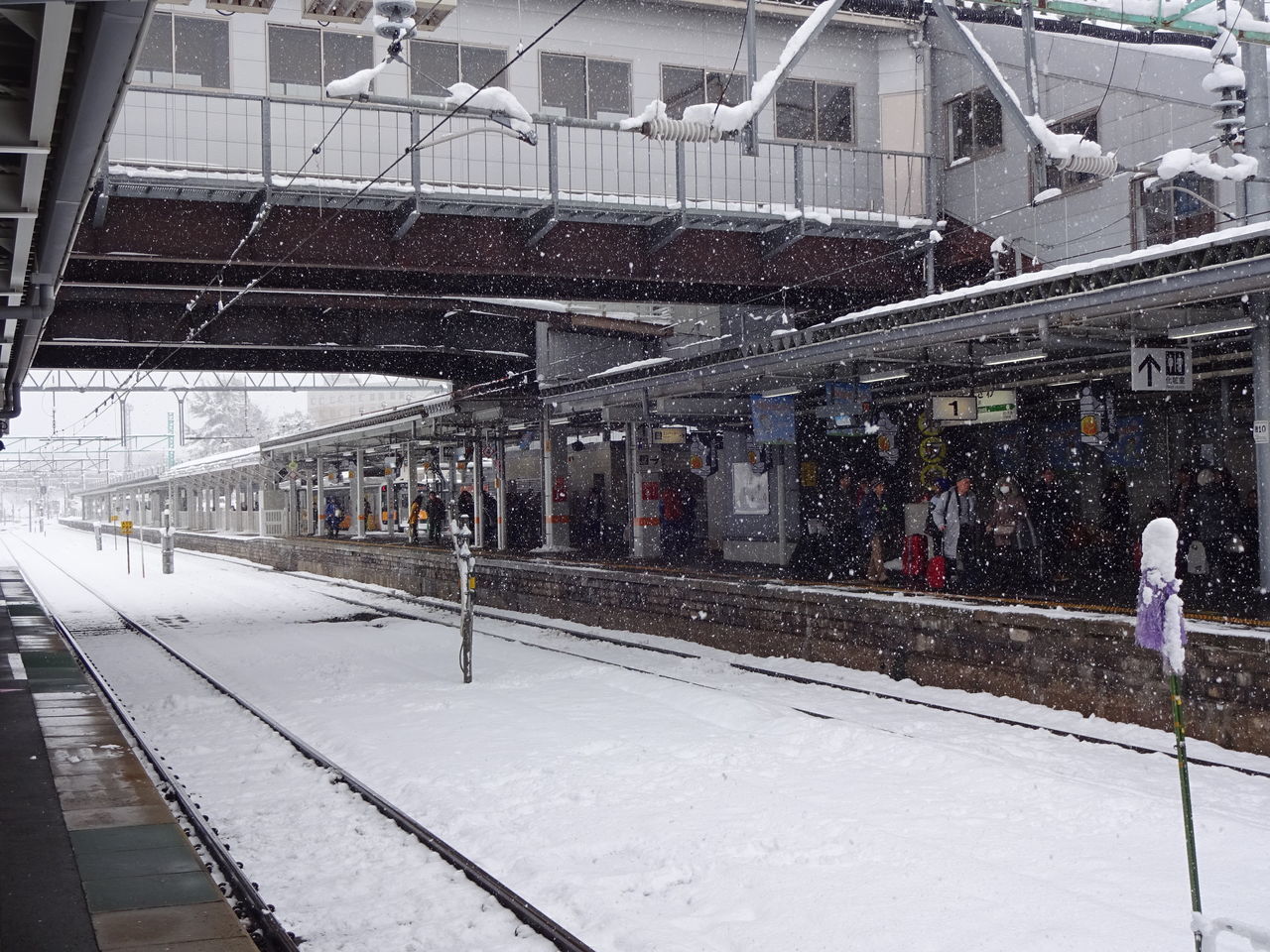 VIEW OF RAILROAD STATION DURING WINTER