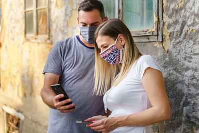 Young woman using mobile phone