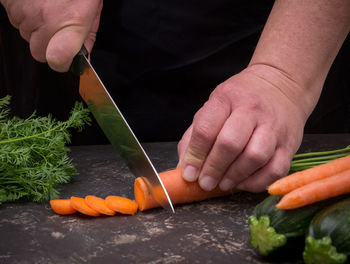 Midsection of person preparing food