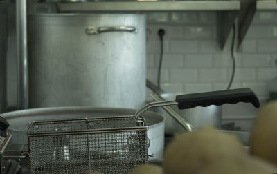 Close-up of colander in commercial kitchen