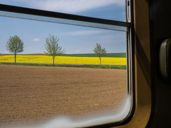 View of landscape seen through airplane window