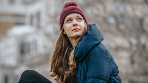 Portrait of young woman in winter