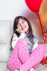 Portrait of a smiling girl at home