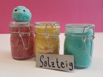 Close-up of drink in glass jar on table