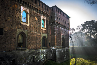 Low angle view of old building against sky