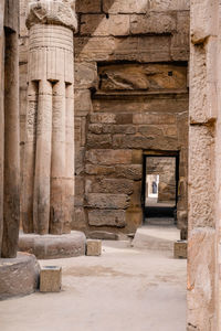 Man framed in a doorway of the luxor temple