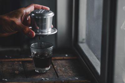 Man holding coffee cup