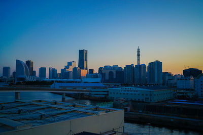 Cityscape against clear sky