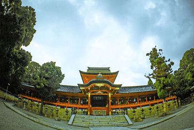 Temple against cloudy sky