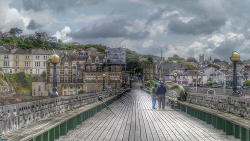 View of bridge against cloudy sky