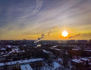 High angle view of cityscape against sky during sunset