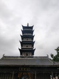 Low angle view of pagoda against sky