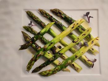 High angle view of vegetables in plate on table