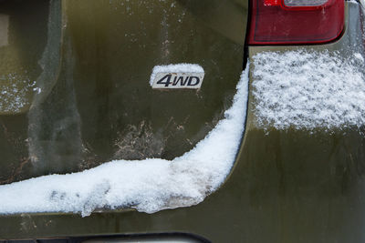 Close-up of snow on car