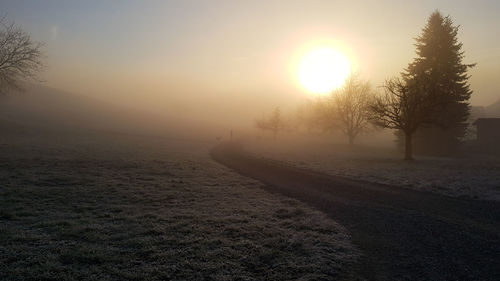 Scenic view of landscape against sky during sunset