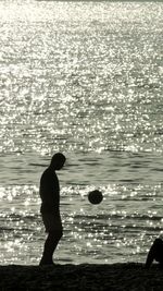 Reflection of woman in water