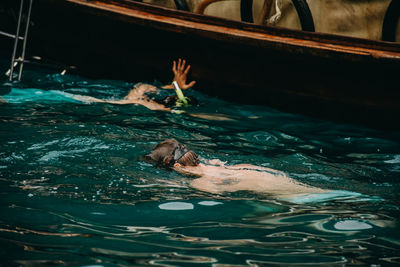 Woman swimming in pool