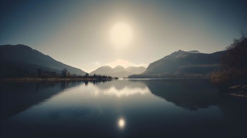 Scenic view of lake against sky during sunset