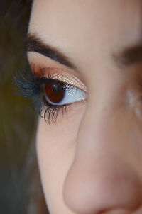 Cropped image of woman looking away