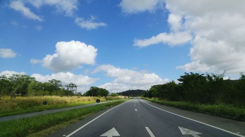 Empty road against sky