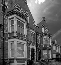 Low angle view of old building against sky