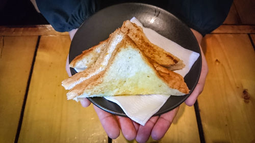 Low section of person holding ice cream