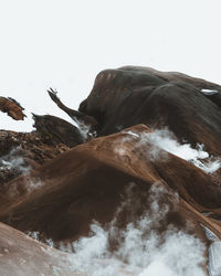 Scenic view of mountain against sky during winter