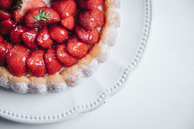 High angle view of strawberries in plate