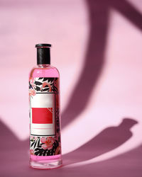 Close-up of glass bottle on table