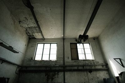 Low angle view of abandoned ceiling
