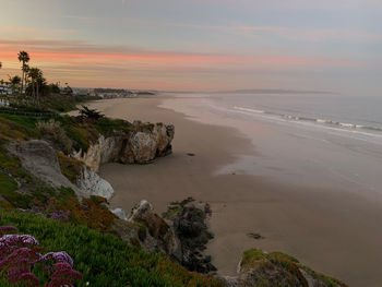 Scenic view of sea against sky during sunrise 