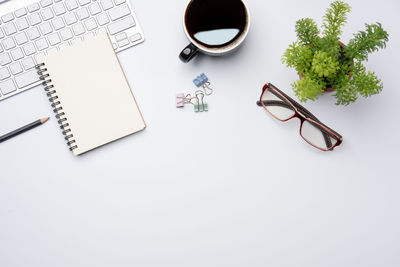 High angle view of coffee cup on table