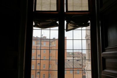 Reflection of building on glass window