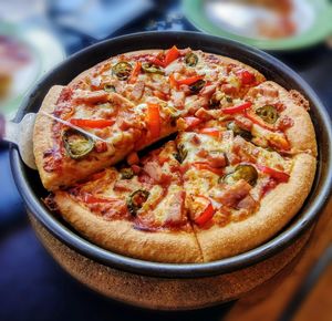 High angle view of pizza on table