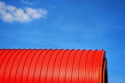 Low angle view of red roof against sky