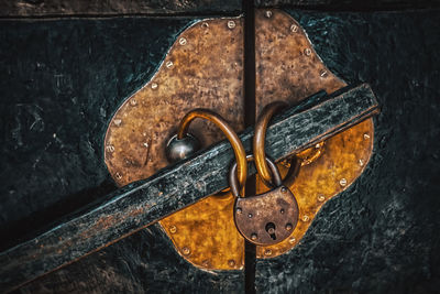 Close-up of padlock on door