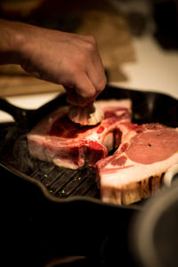 Close-up of person preparing food